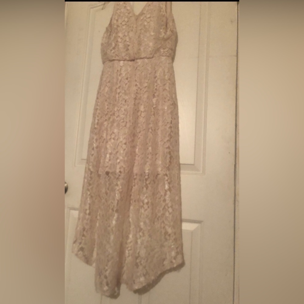 Beautiful lace dress knee length in front maxi length at back